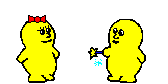 little yellow blobs passing a wand back and forth. one has eyelashes and a bow